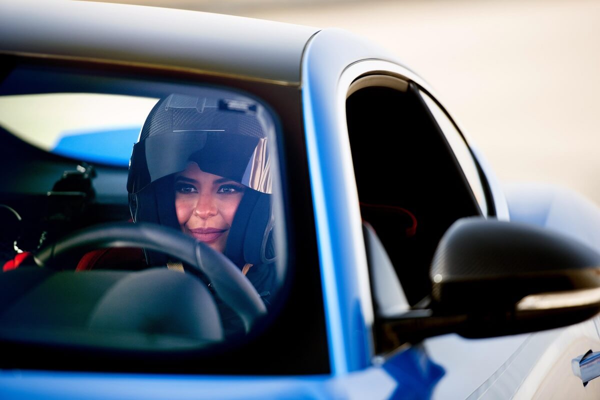 Saudi female racer, Aseel Al Hamad marks the end of the ban on women drivers in Saudi Arabia with a special drive in a Jaguar F-TYPE.jpg