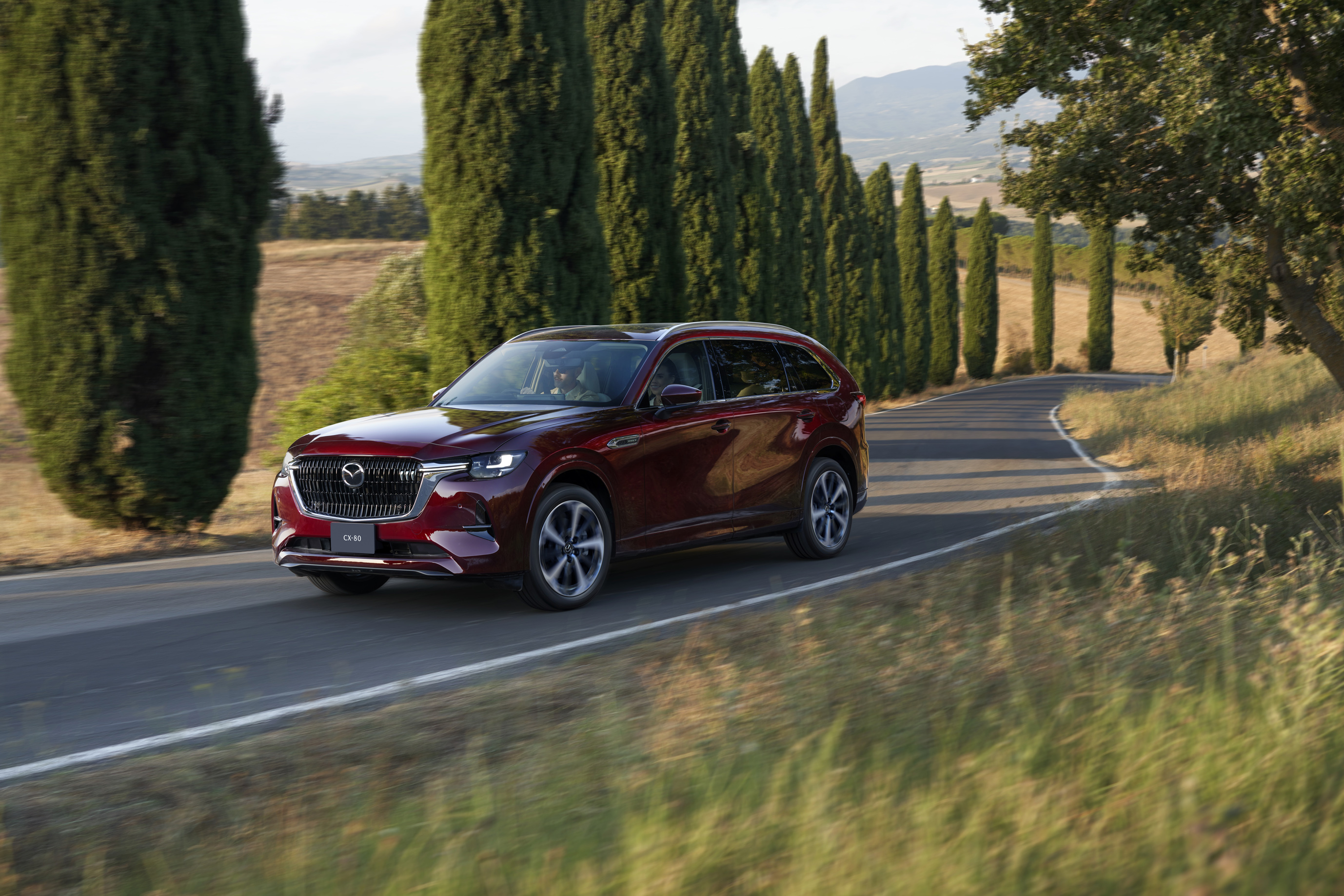 01_cx-80_running_artisanred_int_premiummodern_whitenappaleather_phev_l.jpg